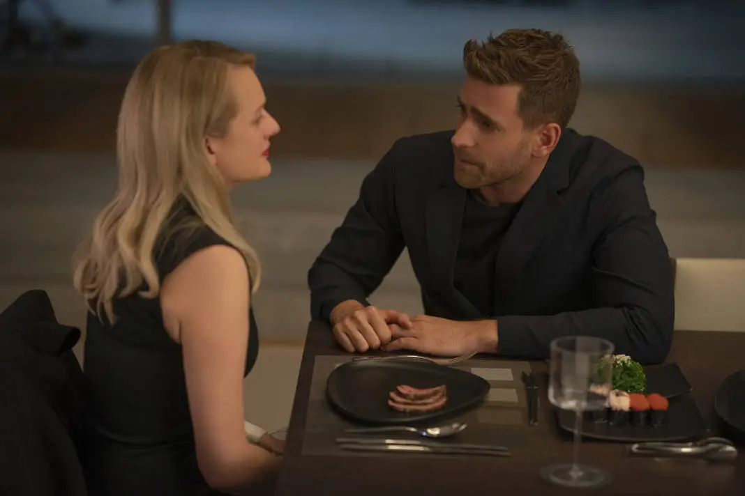 (from left) Cecilia Kass (Elisabeth Moss, back to camera) and Adrian Griffin (Oliver Jackson-Cohen) in The Invisible Man, written and directed by Leigh Whannell.
