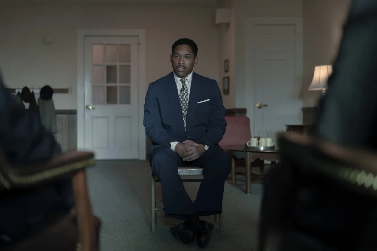 Martin Luther King Jr., played by Kelvin Harrison Jr., interviews with the church deacons.