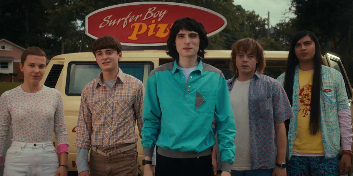(L to R) Millie Bobby Brown as Eleven, Noah Schnapp as Will Byers, Finn Wolfhard as Mike Wheeler, Charlie Heaton as Jonathan Byers, and Eduardo Franco as Argyle.