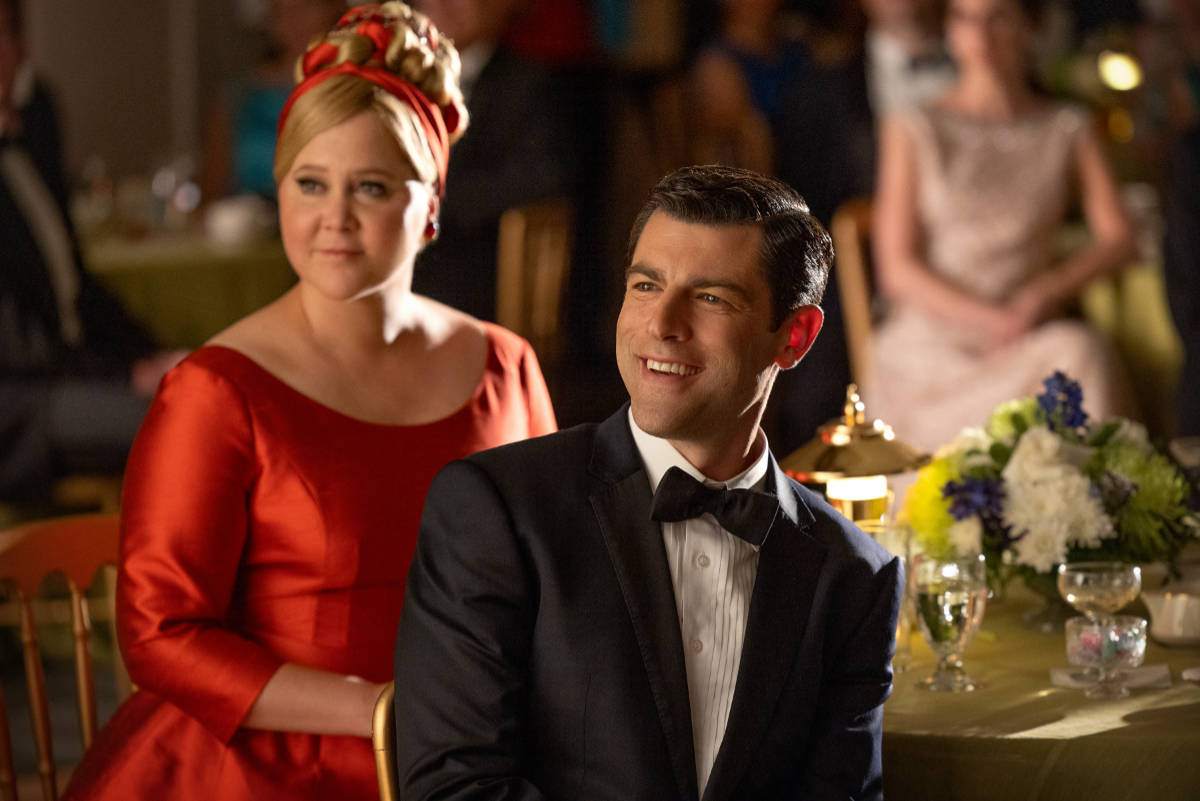 Amy Schumer as Marjorie Post and Max Greenfield as Rick Ludwin.