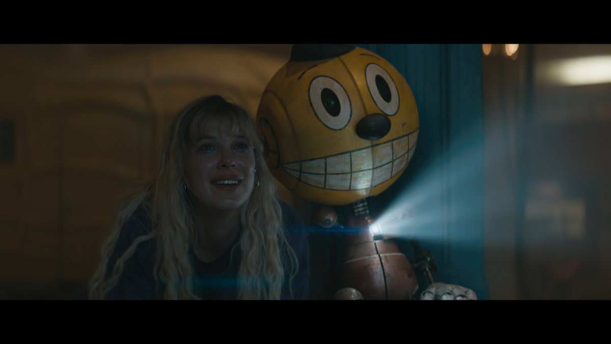 Michelle (Millie Bobby Brown) with Cosmo (voiced by Alan Tudyk)