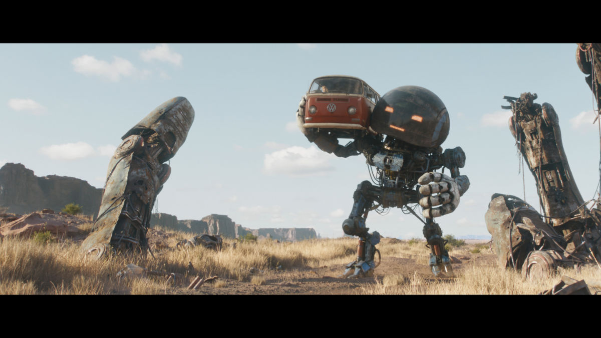 Herman (voiced by Anthony Mackie) provides a helping hand to Michelle (Millie Bobby Brown), Cosmo (voiced by Alan Tudyk) and Keats (Chris Pratt)