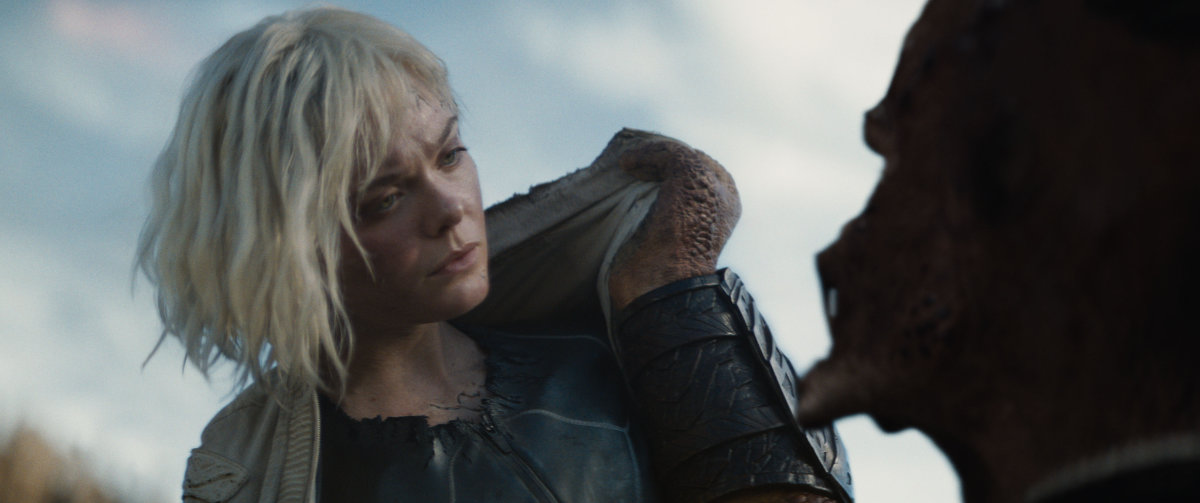 Thia (Elle Fanning) and Dek (Dimitrius Schuster-Koloamatangi)