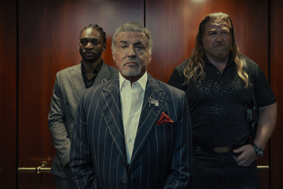 Jay Will as Tyson, Sylvester Stallone as Dwight Manfredi and Mike Walden as Bigfoot