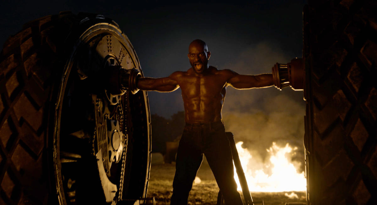 Michael James Shaw as Axel