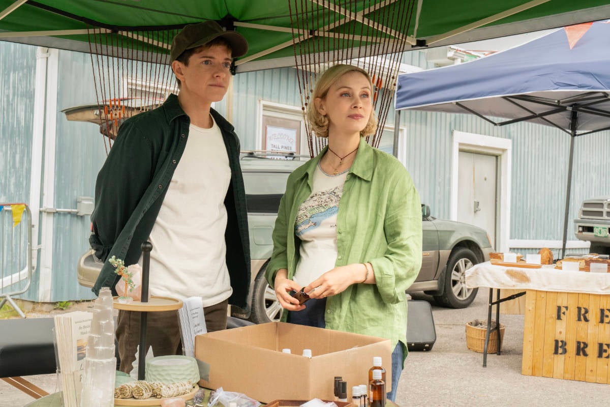 Mae Martin as Alex Dempsey and Sarah Gadon as Laura Redman