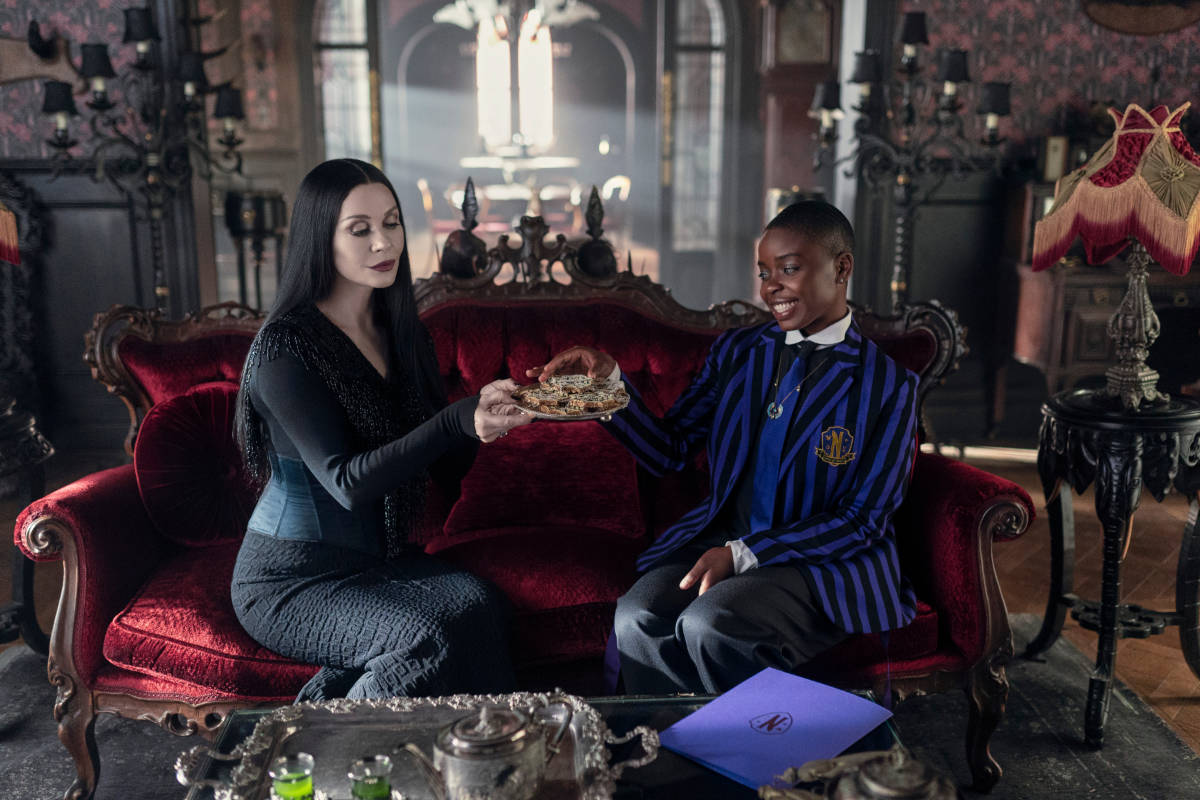 Catherine Zeta-Jones as Morticia Addams, Joy Sunday as Bianca Barclay