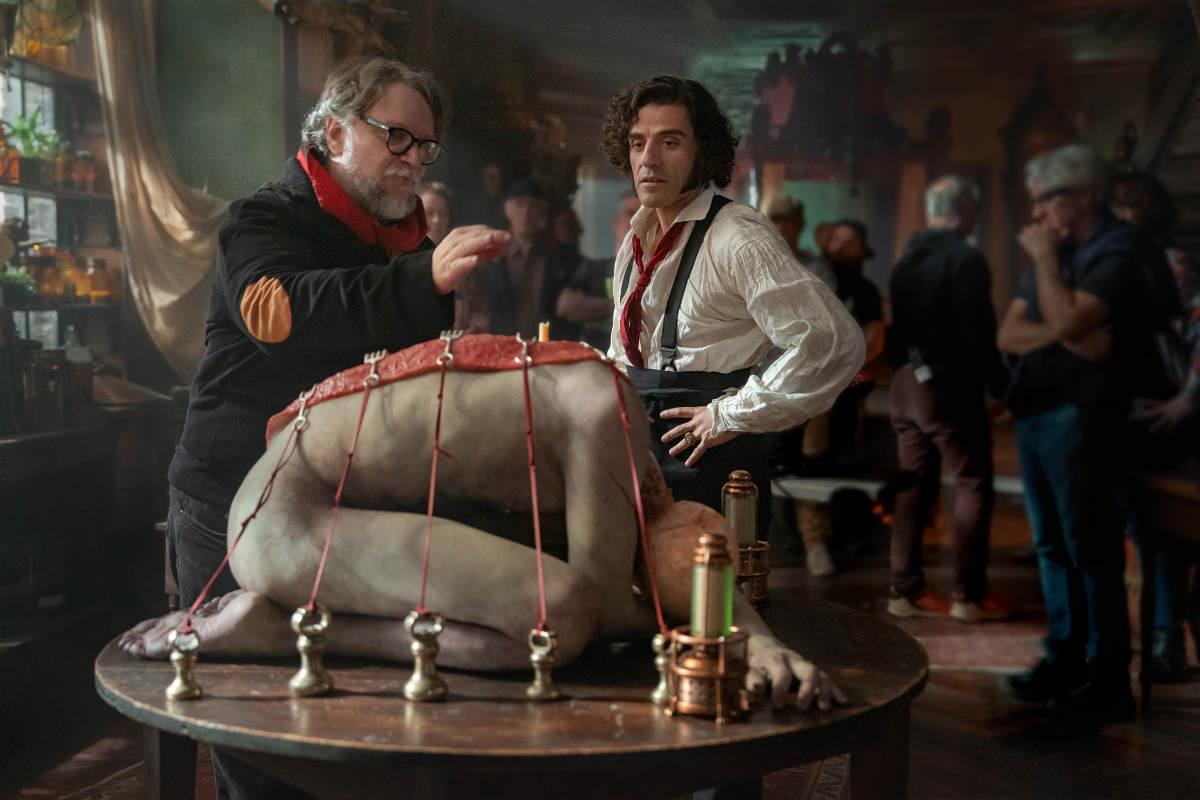Director Guillermo del Toro and Oscar Issac as Victor Frankenstein