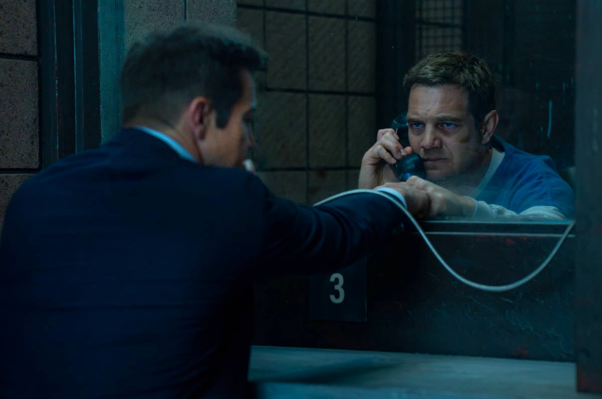 Jeremy Renner as Mike McLusky and Taylor Handley as Kyle McLusky