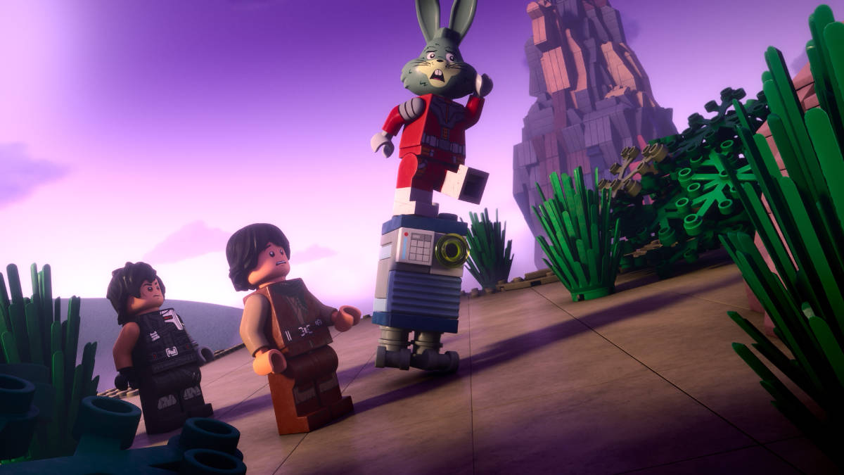 Dev Greebling (Tony Revolori), Sig Greebling (Gaten Matarazzo), and Servo (Michael Cusack), meet Jaxxon (Ben Schwartz) in Forcehold