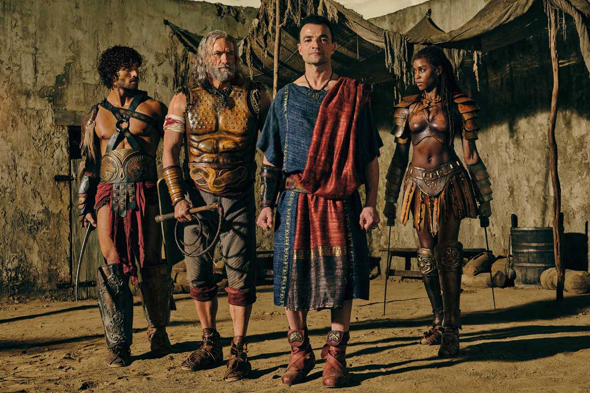 Jordi Webber (“Tarchon”), Graham McTavish (“Korris”), Nick E. Tarabay (“Ashur”) and Tenika Davis (“Achillia”) in Spartacus: House of Ashur