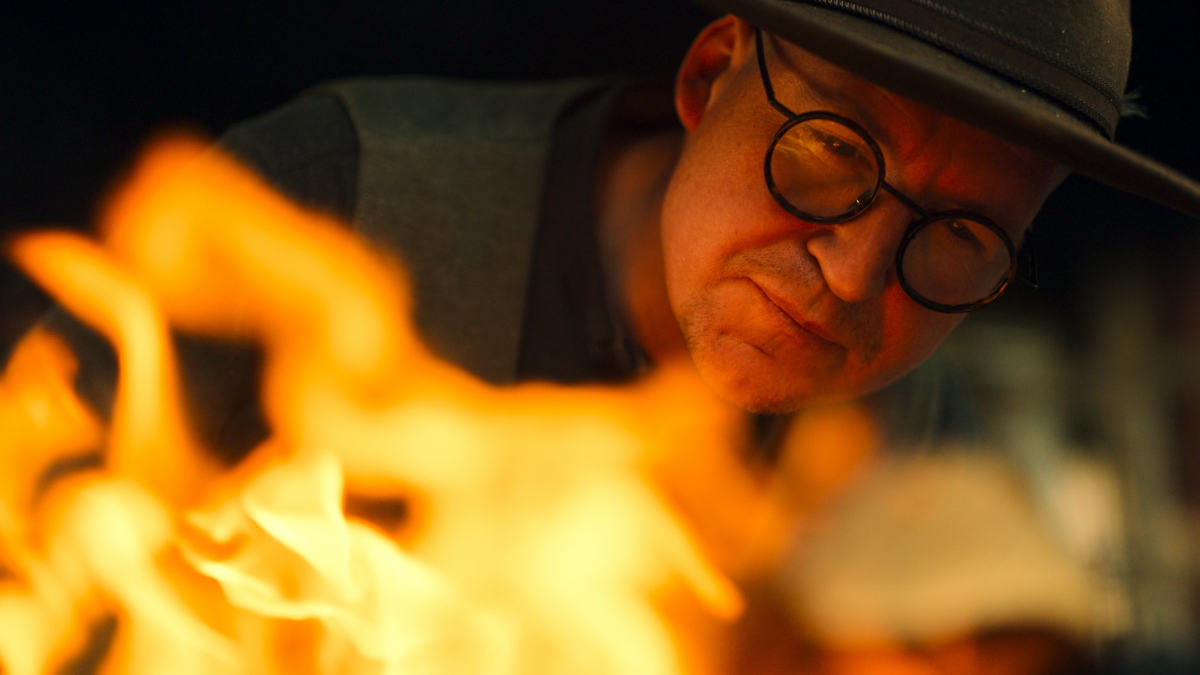 Knystaforsen owner and Head Chef Nicolai Tram cooking over fire