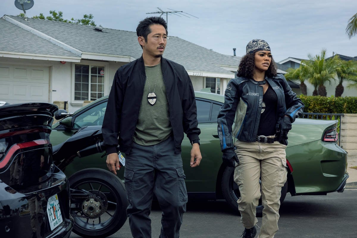 Steven Yeun as Detective Mike Ro and Teyana Taylor as Detective Numa Baptiste