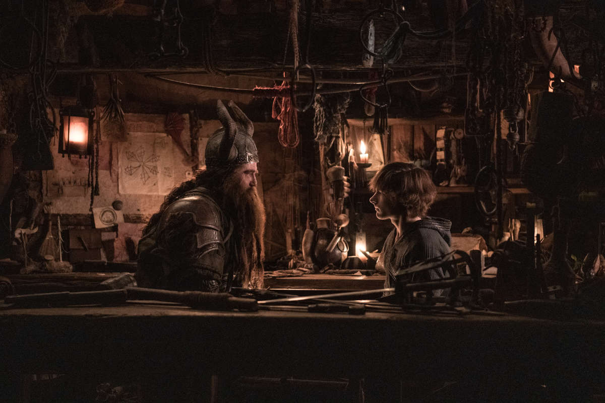 Stoick (Gerard Butler) and Hiccup (Mason Thames)