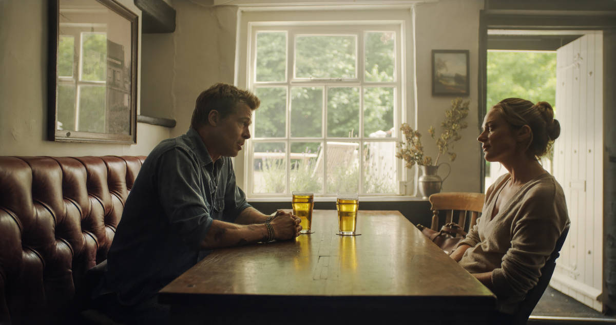 Brad Pitt as Sonny Hayes and Kerry Condon as Kate