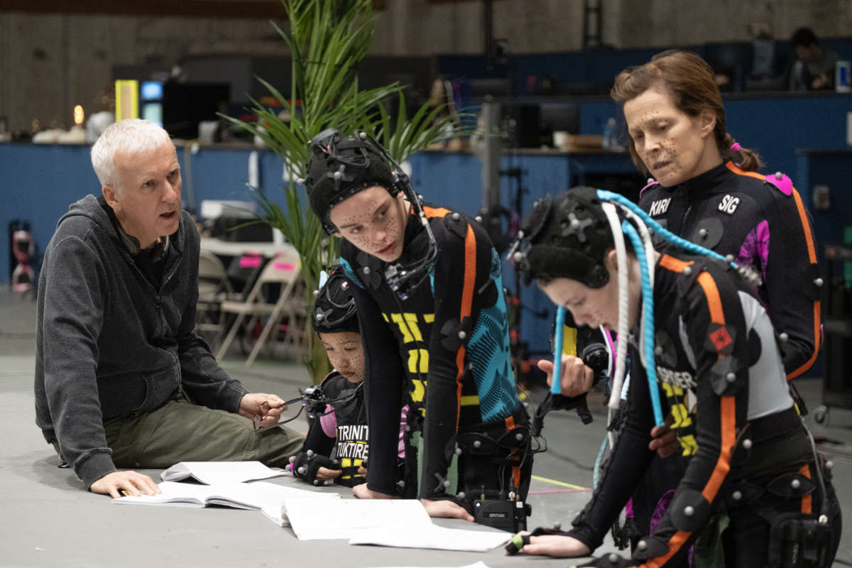 (L-R) Director James Cameron, Trinity Bliss, Britain Dalton, Jack Champion and Sigourney Weaver on the set of 20th Century Studios' AVATAR: FIRE AND ASH.