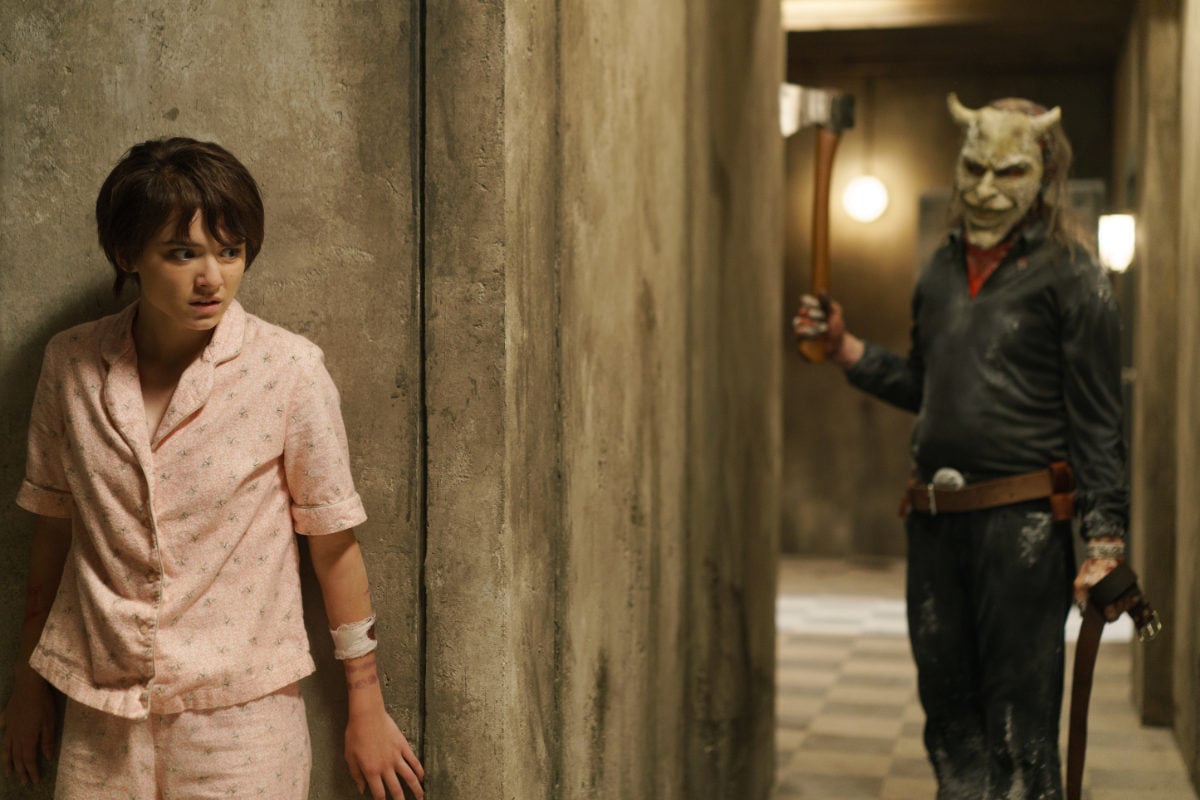 Gwen (Madeleine McGraw) and The Grabber (Ethan Hawke) in Black Phone 2