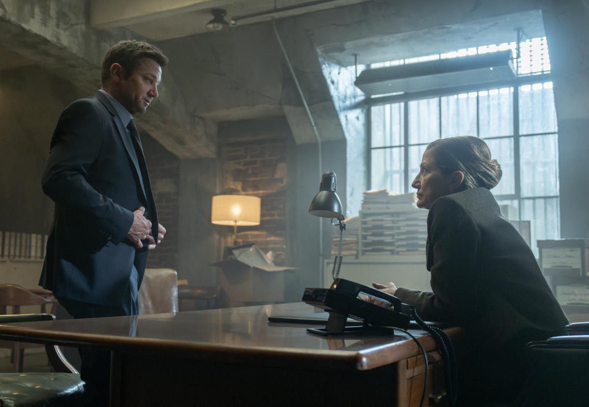 Jeremy Renner as Mike McLusky and Edie Falco as Warden Nina Hobbs