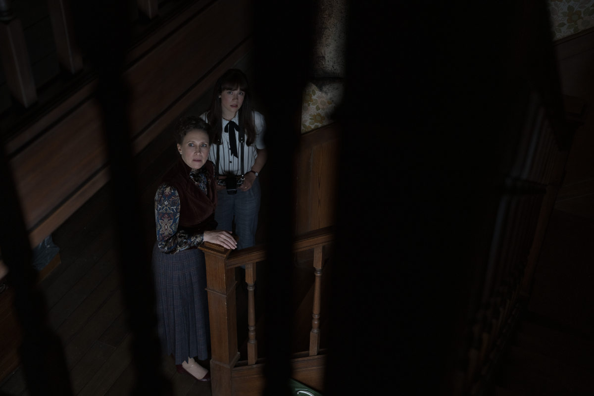 VERA FARMIGA as Lorraine Warren and MIA TOMLINSON as Judy Warren
