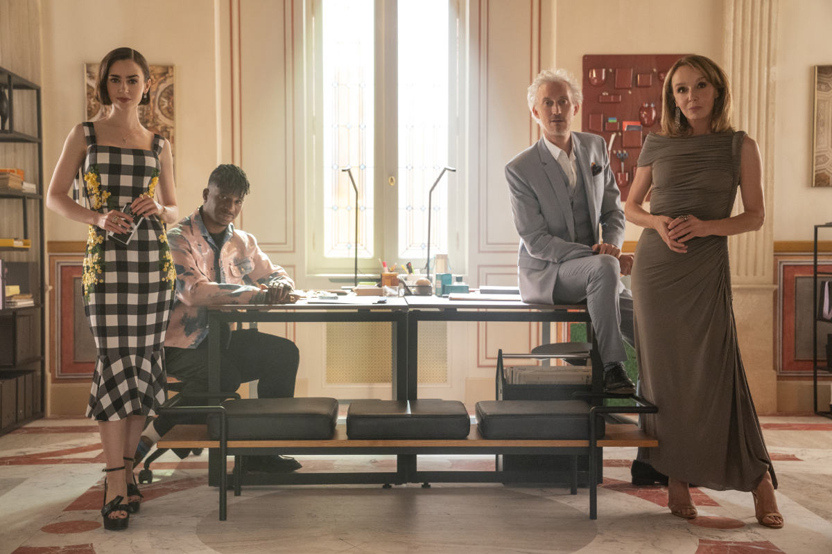 Lily Collins as Emily, Samuel Arnold as Julien, Bruno Gouery as Luc, Philippine Leroy-Beaulieu as Sylvie Grateau