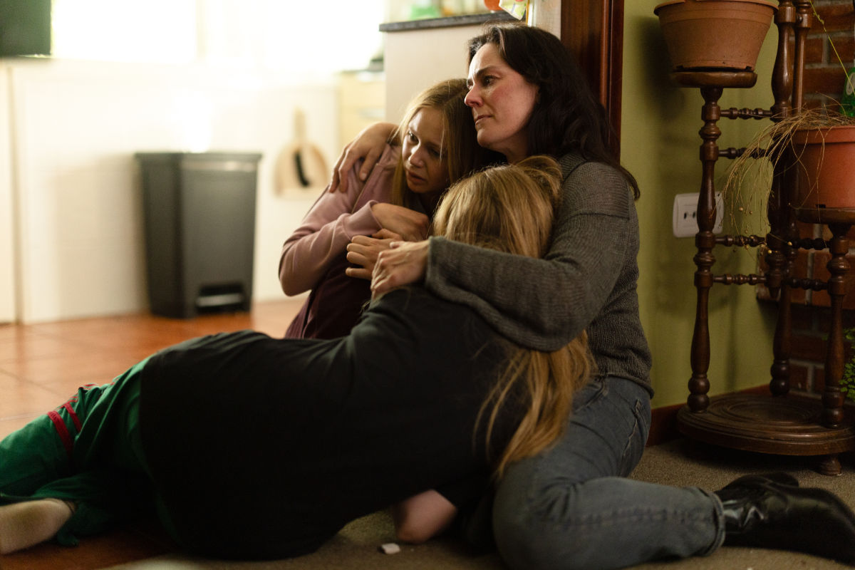 Abby Riser (DELPHI EVANS), Lily Riser (TALLALUH EVANS) and Eve Riser (JILL HALFPENNY)