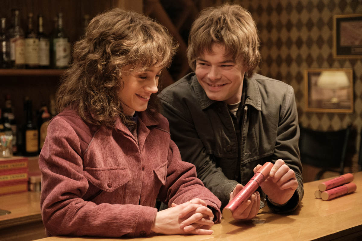 Natalia Dyer as Nancy Wheeler and Charlie Heaton as Jonathan Byers in One Last Adventure.