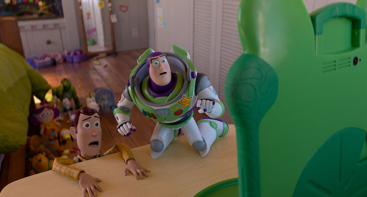 Buzz Lightyear (voiced by Tim Allen) and Woody (voiced by Tom Hanks)