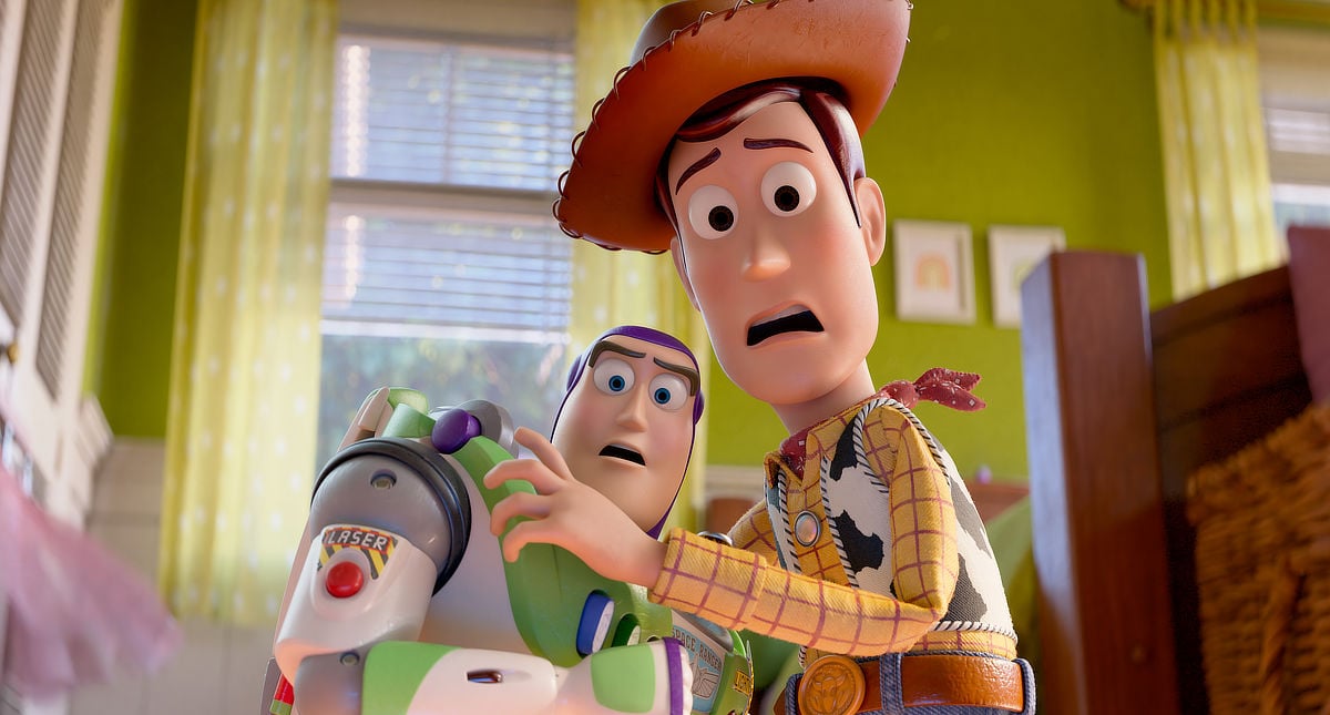 Buzz Lightyear (voiced by Tim Allen) and Woody (voiced by Tom Hanks)