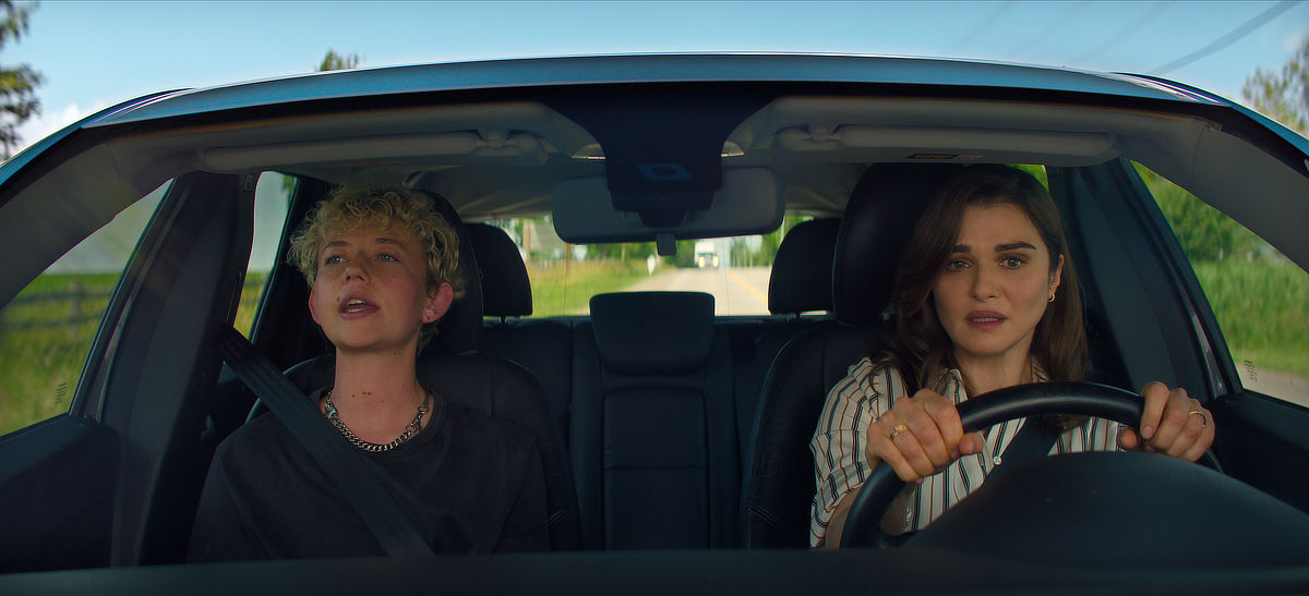 Ellen Robertson as Sid and Rachel Weisz as M