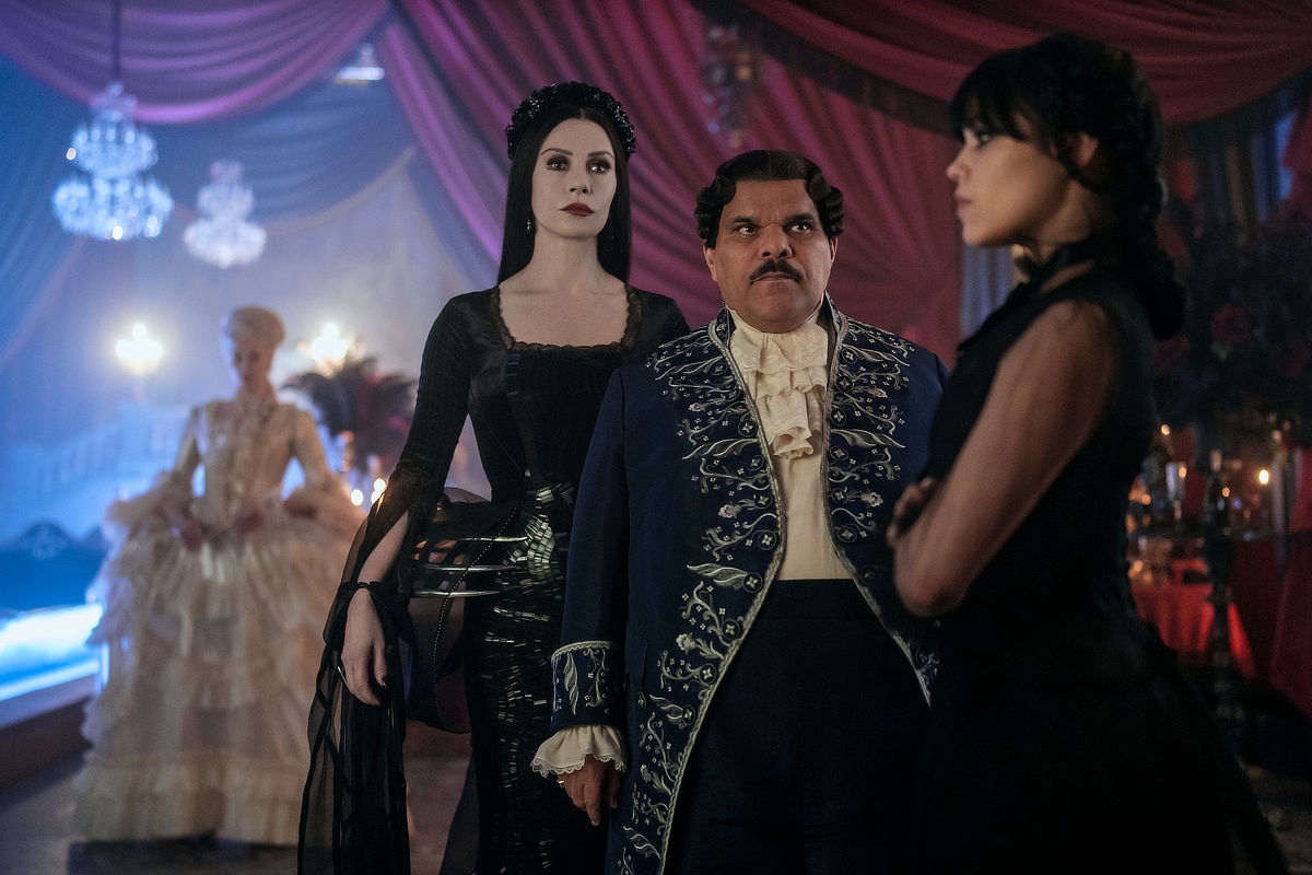 Catherine Zeta-Jones as Morticia Addams, Luis Guzmán as Gomez Addams, Jenna Ortega as Wednesday Addams 