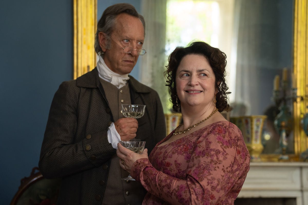 Mr. Bennet (Richard E. Grant) & Mrs. Bennet (Ruth Jones) 