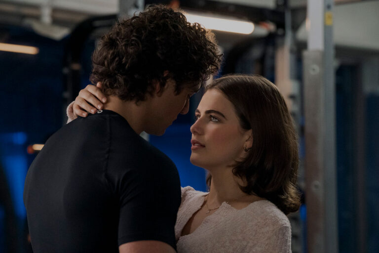 Garrett (Belmont Cameli) and Hannah (Ella Bright) embrace in Off Campus, coming to Prime Video.