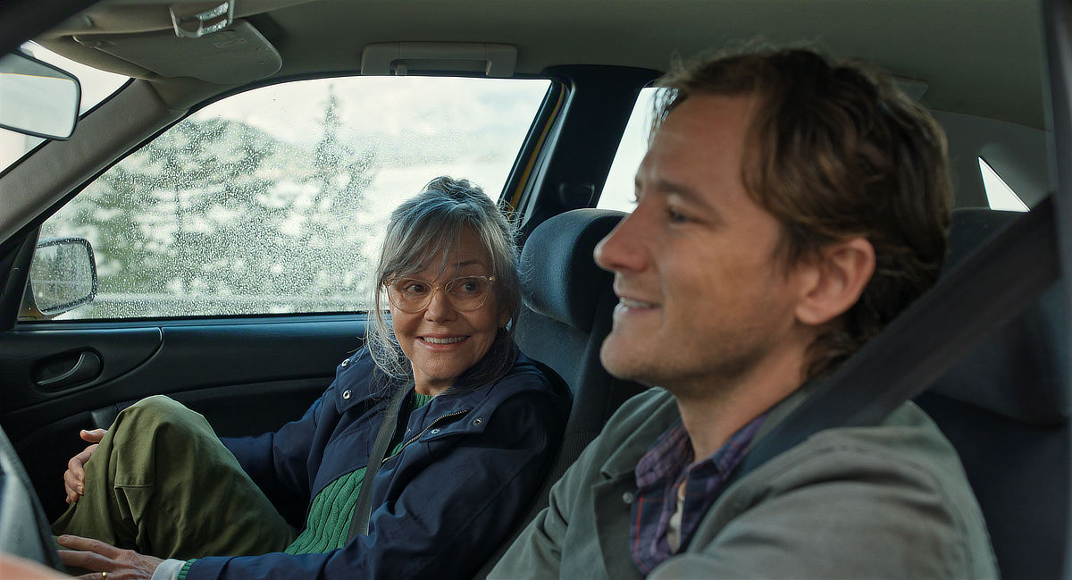 Sally Field as Tova and Lewis Pullman as Cameron