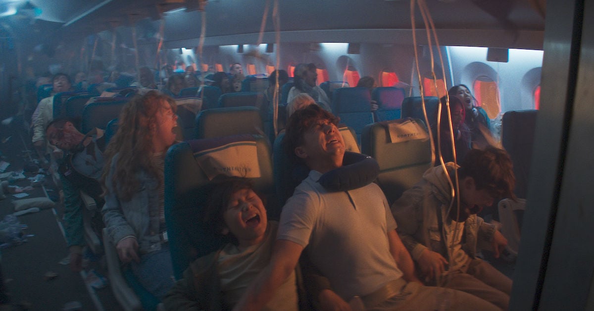 A photo of a passengers of a plane that is crashing.
