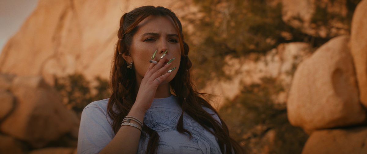 Bella Thorne smoking a cigarette