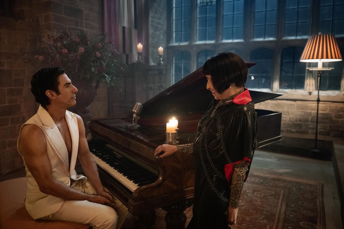 Sacha Baron Cohen as Damien Sachs and Kathryn Hunter as Glenda Cartwright