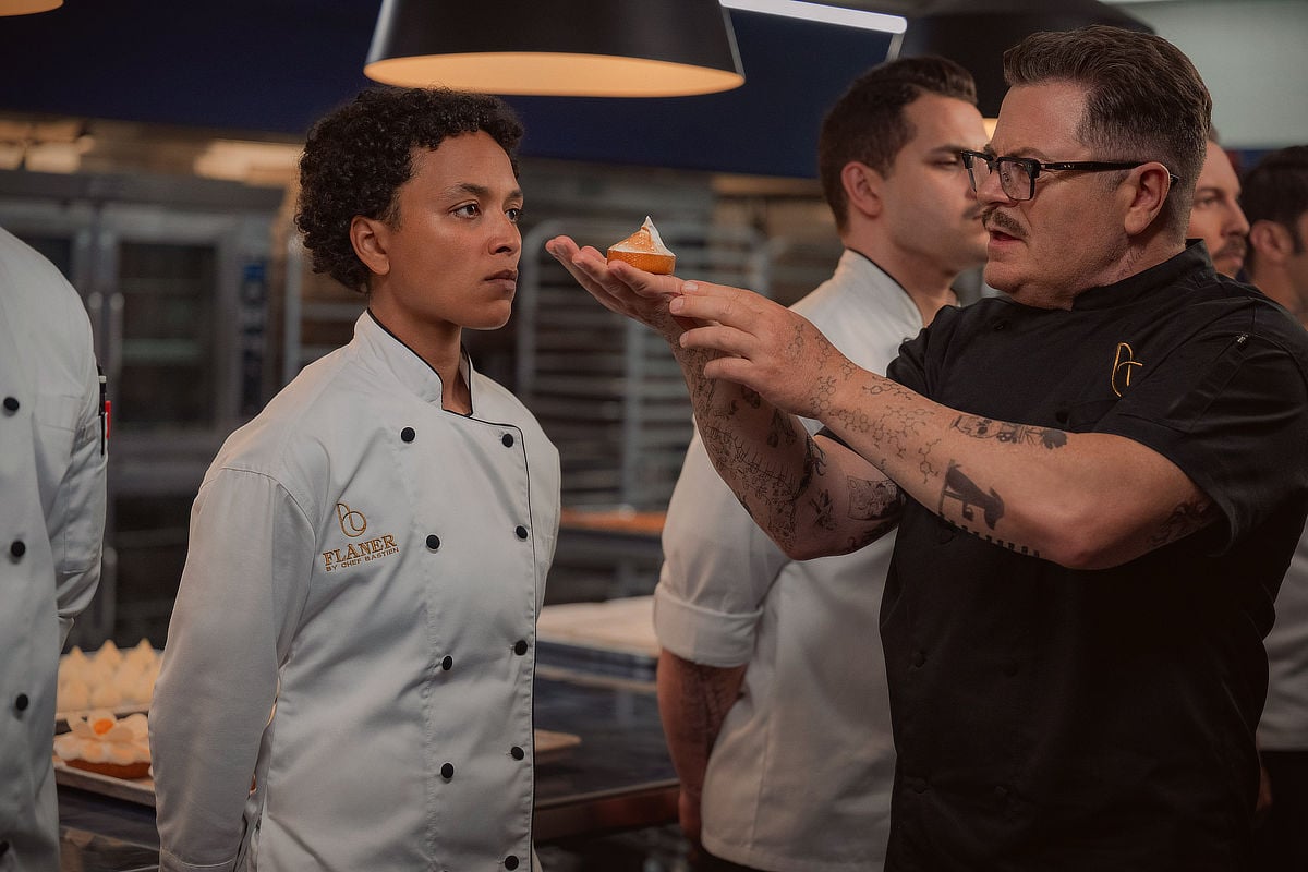 Megan Danso as Zella and Nick Offerman as Chef Bastien