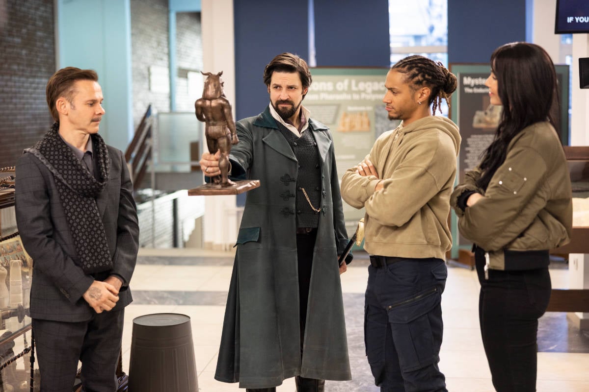 The team examines a statue in The Librarians: The Next Chapter