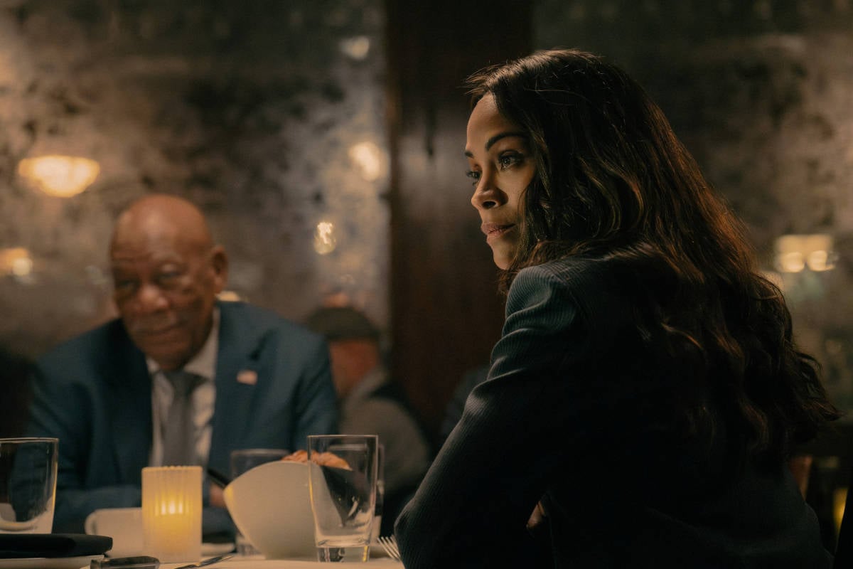 Morgan Freeman as Edwin Mullins and Zoe Saldaña as Joe