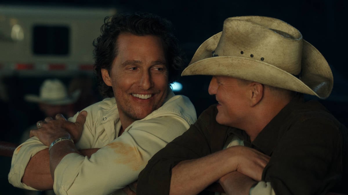 Matthew McConaughey and Woody Harrelson smiling