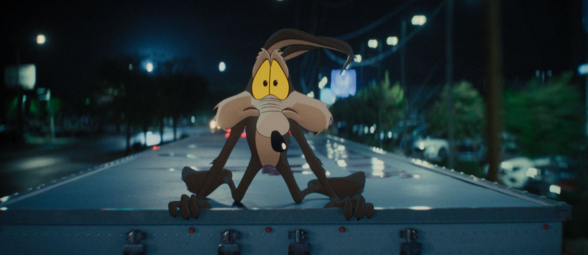 Wile E. on top of a truck