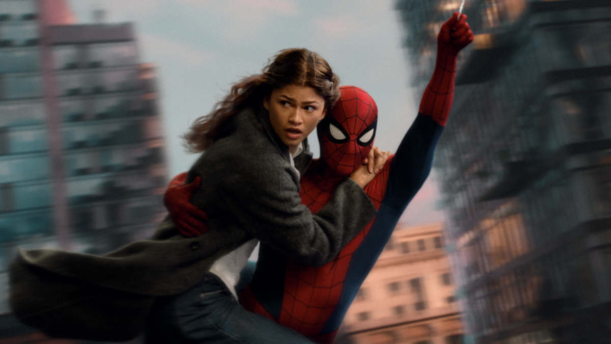 MJ (Zendaya) swings through the city with Spider-Man