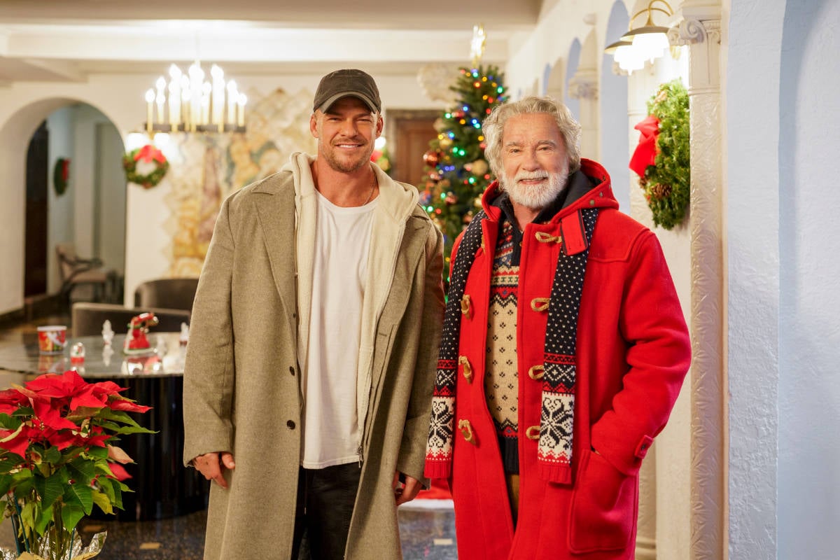 Alan Ritchson as Vance and Arnold Schwarzenegger as Santa