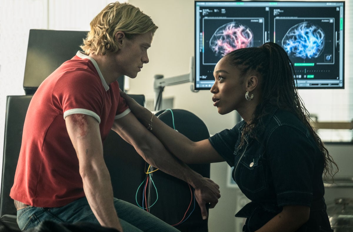 TOM RHYS HARRIES as Matt Hagen and NAOMI ACKIE as Caitlyn Corr