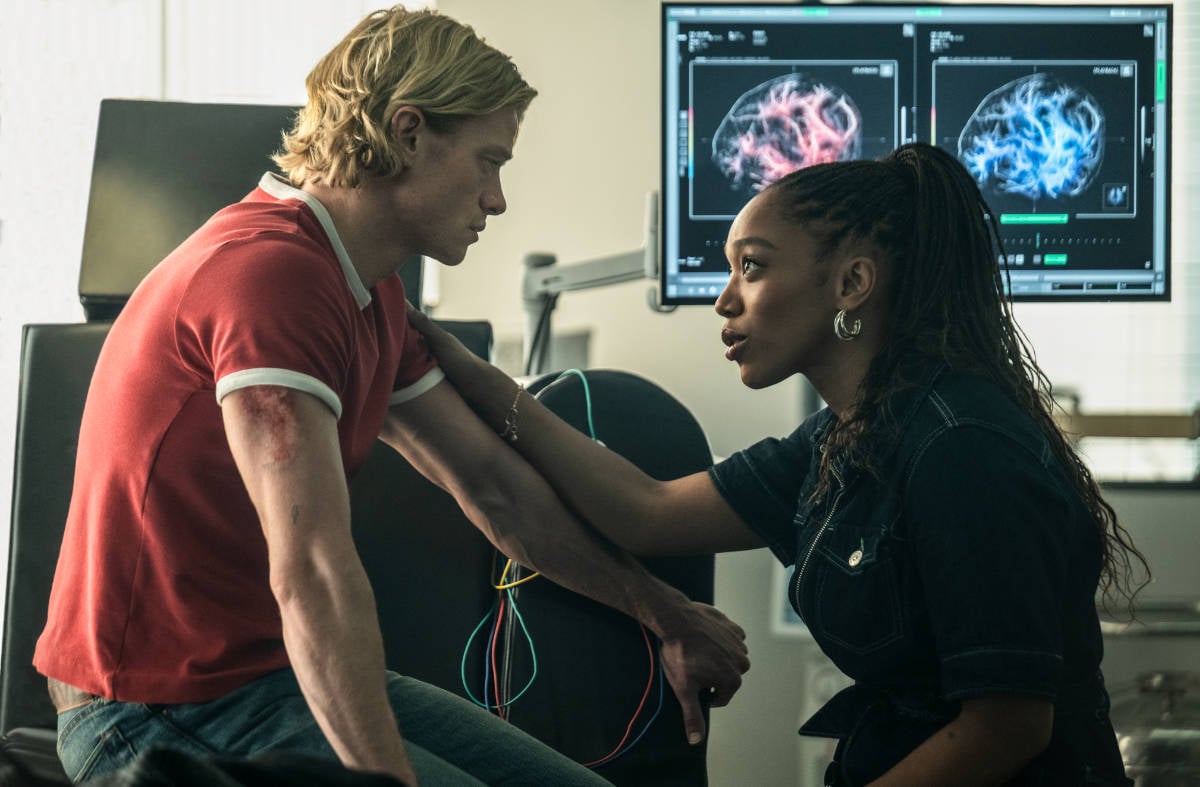 TOM RHYS HARRIES as Matt Hagen and NAOMI ACKIE as Caitlyn Corr in Clayface