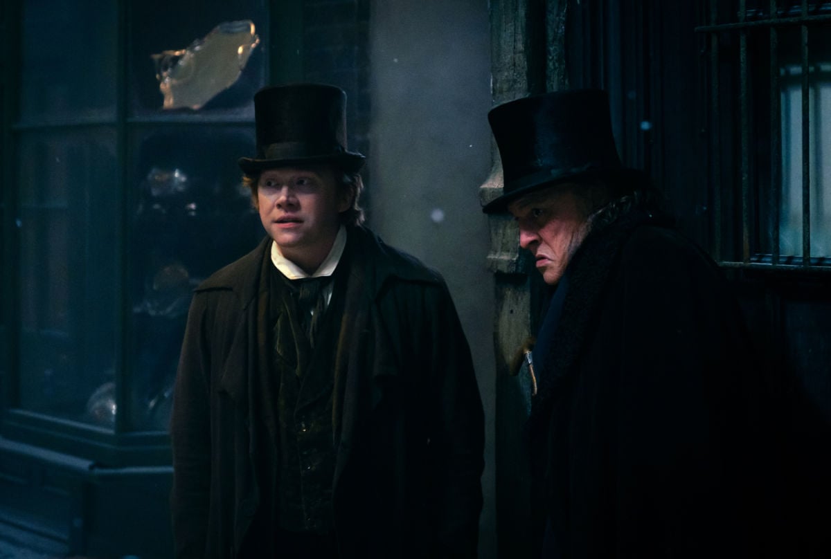 Rupert Grint plays Bob Cratchit and Johnny Depp plays Ebenezer Scrooge