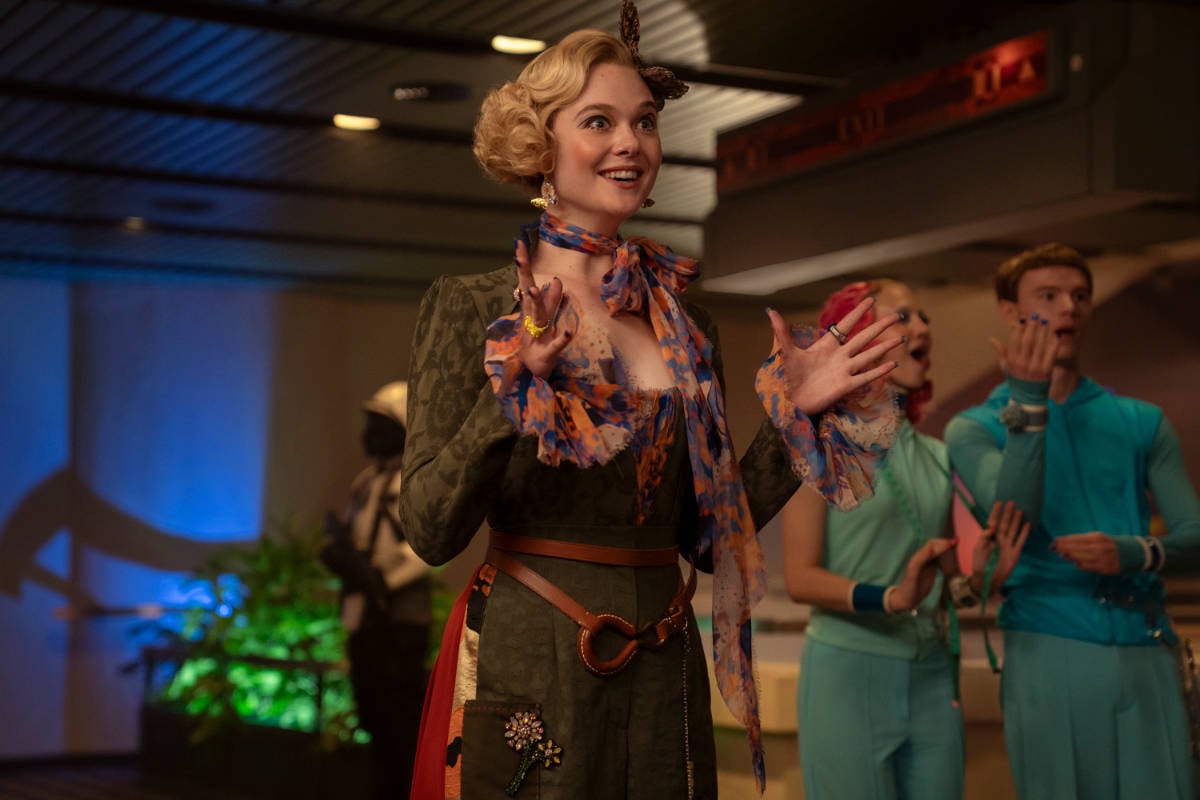Elle Fanning as Effie Trinket