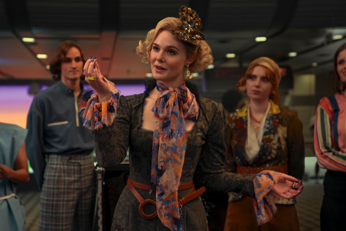 Elle Fanning as Effie Trinket